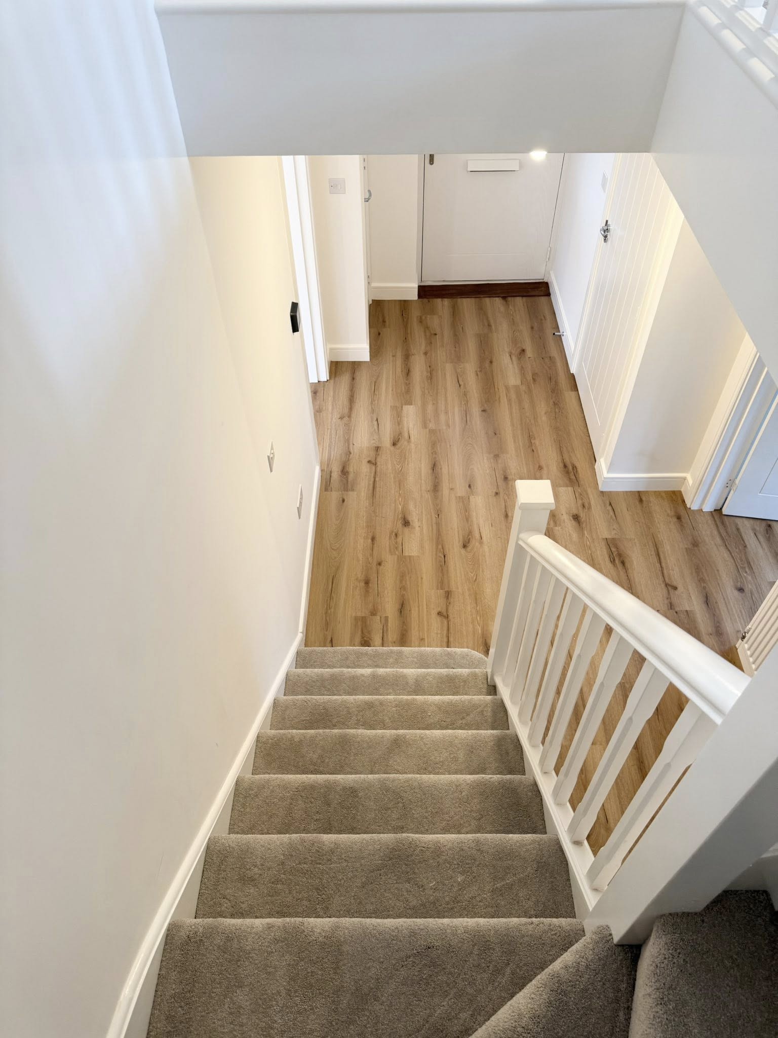 Stair carpet and LVT hallway installation